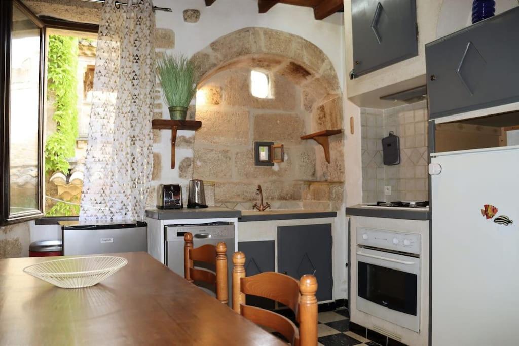 Entre Uzes Et Le Pont-Du-Gard Le Logis D'Autrefois Appartement Castillon-du-Gard Buitenkant foto